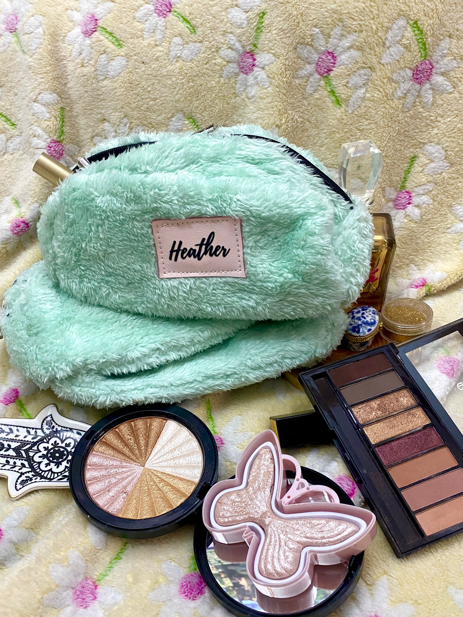 Heather mint green fur makeup bag